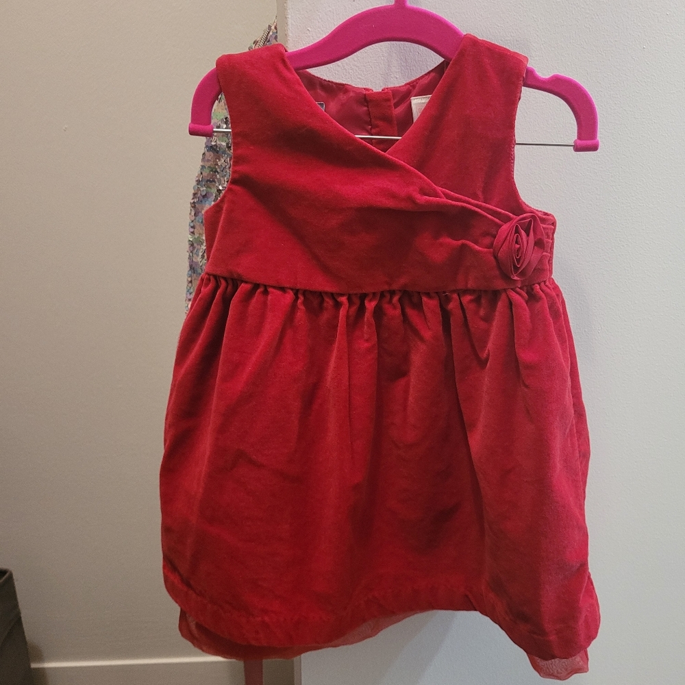 Red Sleeveless Dress with Floral Accent